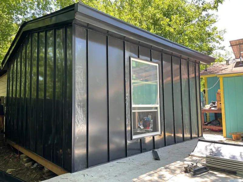 Black standing seam metal wall panels for Roof Inspection in Flint