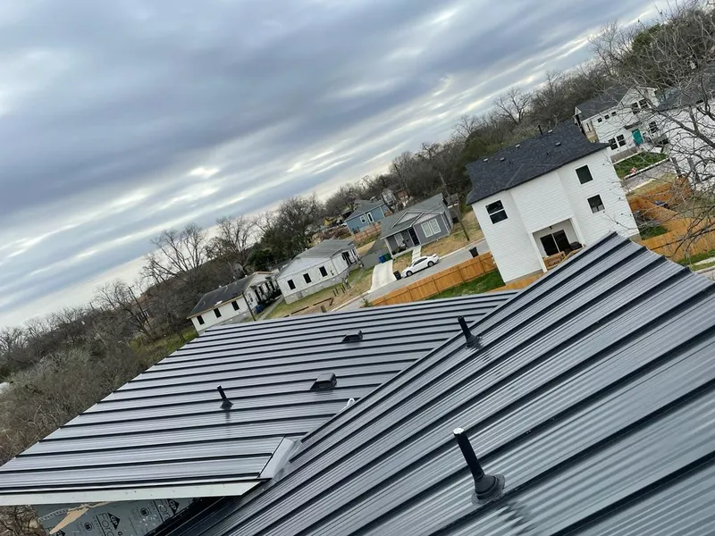 Standing seam metal roof panels with vents for Skylight Repair in Flint